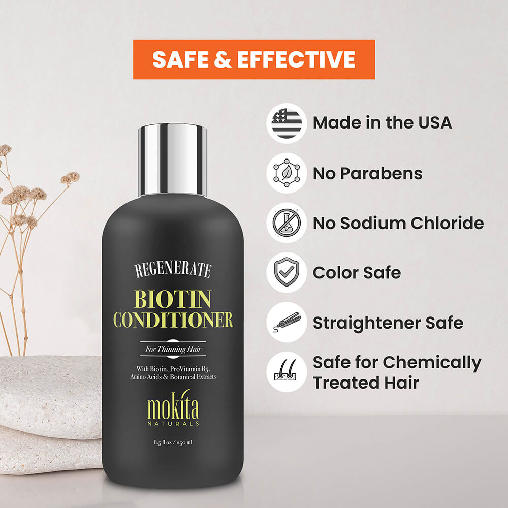 Biotin conditioner bottle with safety features listed on a light gray background